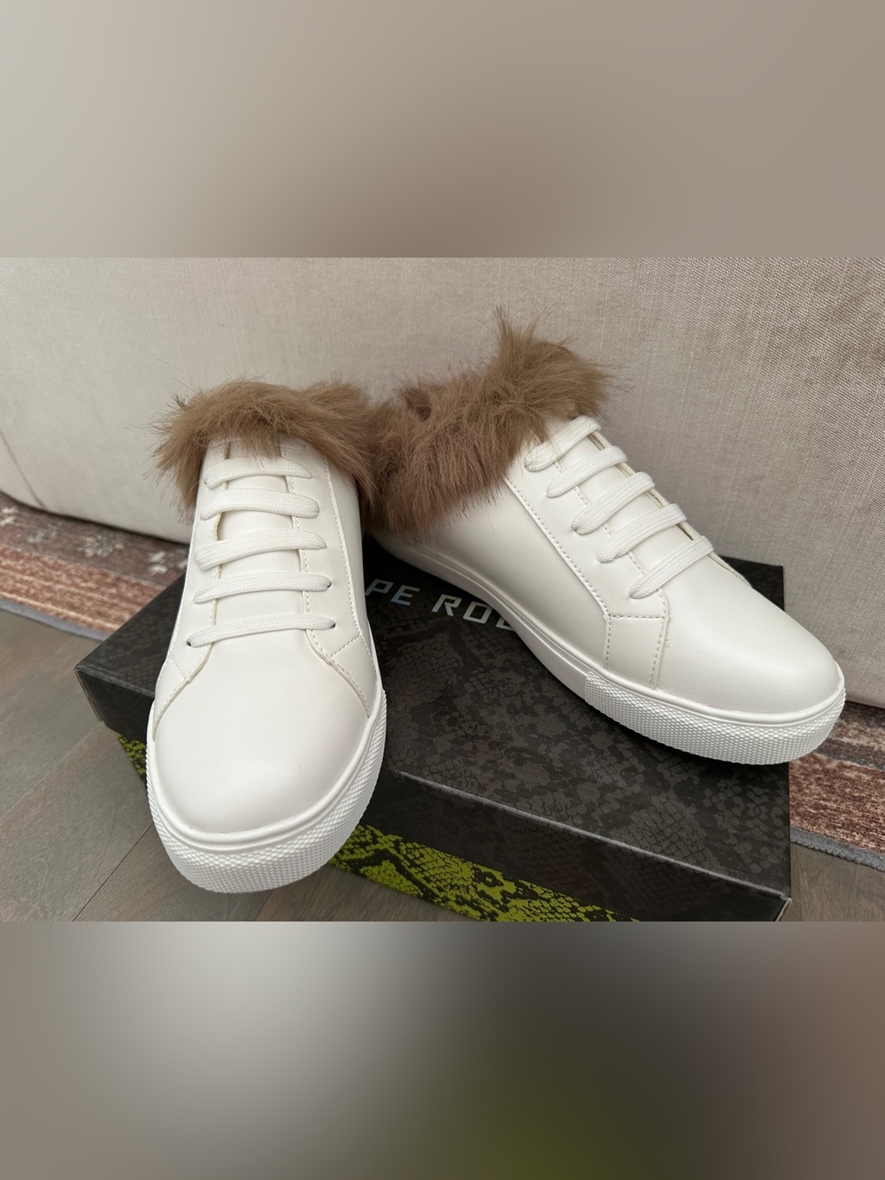 Classic White Leather Sneaker with Brown Fur Trim